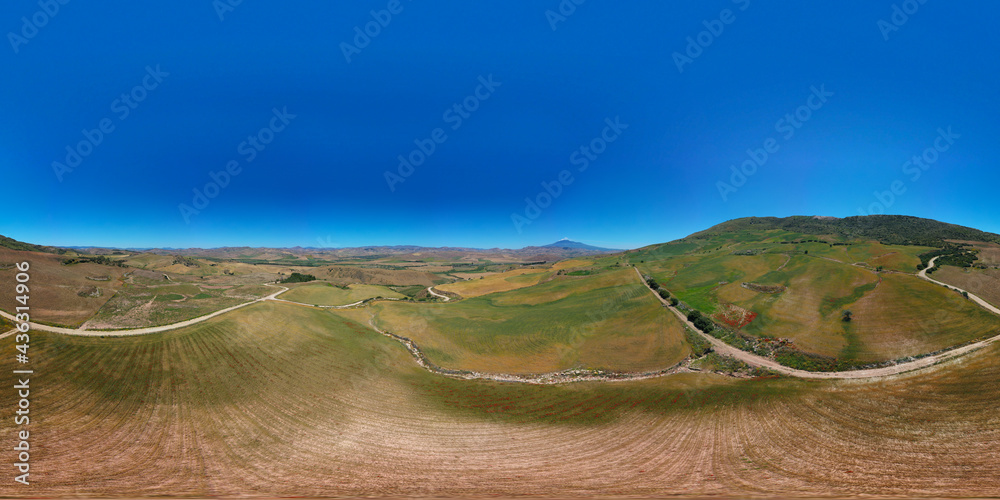 360 degree aerial photo of the wheat fields in the heart of Sicily in ...
