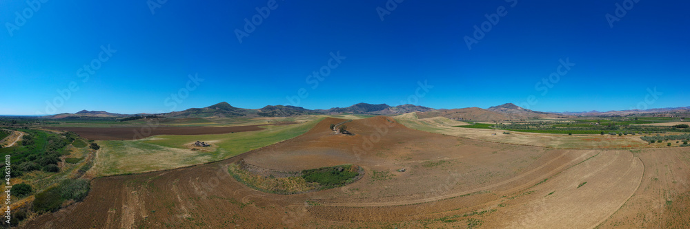 180 degree saerial photo of the wheat fields in the heart of Sicily in ...