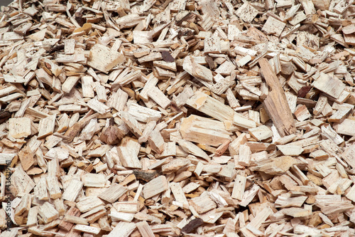 Wood chips and sawdust as production waste. Texture and background