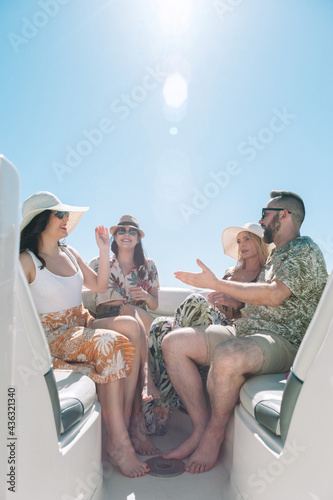 Friends having a party on boat at the mediterranean sea