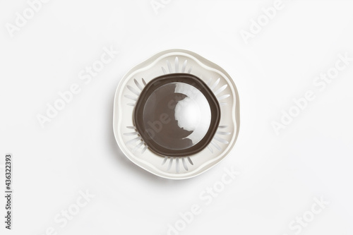 Plastic bowl with tray isolated on white background. High-resolution photo.