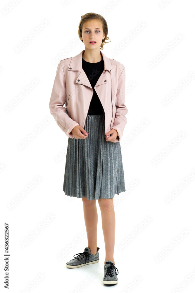 Pretty fashionable stylish teenage girl. Isolated over white background. Pretty fashionable stylish teenage girl. Isolated over white background.