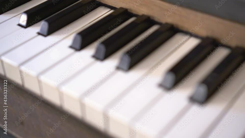 Close-Up Pan Of Organ Keyboard And Draw Stop Knobs With Focal Blur - Erfurt, Germany Close-Up Pan Of Organ Keyboard And Draw Stop Knobs With Focal Blur - Erfurt, Germany
