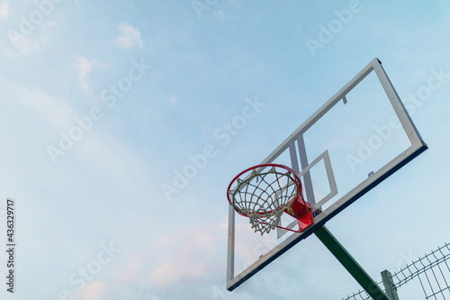 basketball hoop on the background of the forest in the evening © Наталья Бирюкова