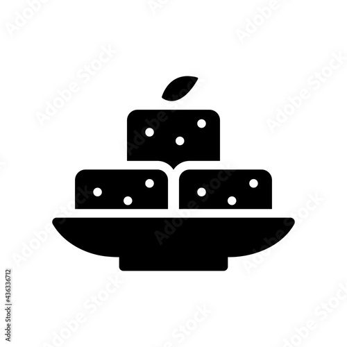 Tofu Vector Icon in Glyph Style. Tofu is a food made of condensed soy milk that is pressed into solid white blocks in a process quite similar to cheesemaking. Vector icon for app, game, or logo
