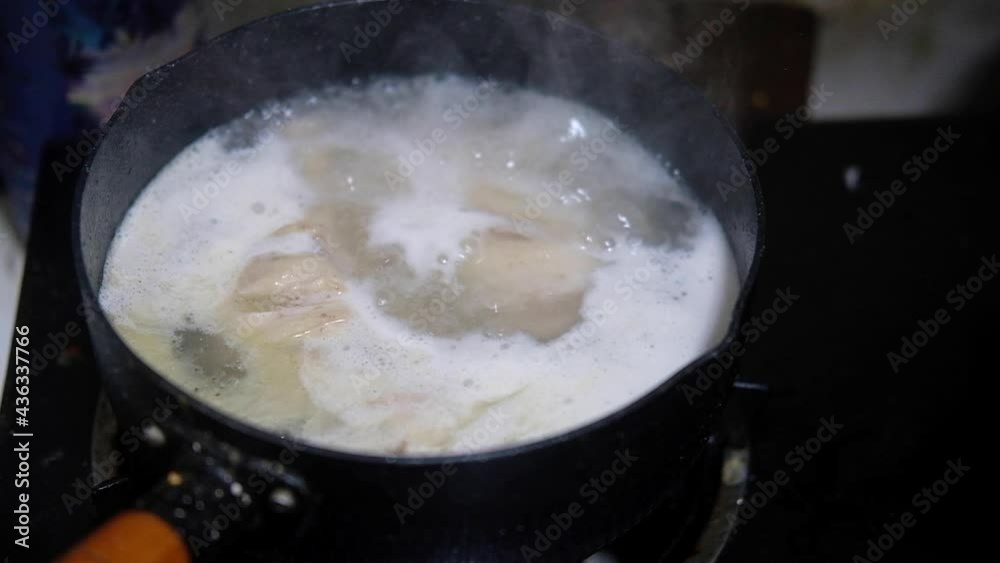 Boiled food in the pot at kitchen, close-up. Boiled food in the pot at kitchen, close-up.