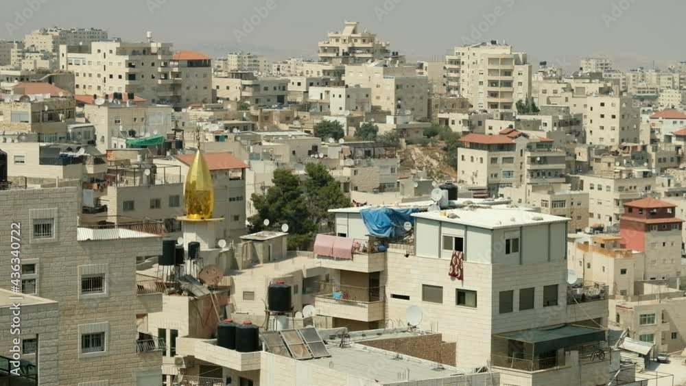 A short Golden capped Mosque, on the rooftops of a village by the vicinity of Jerusalem, a 29.97 fps clip, Jerusalem, Israel. A short Golden capped Mosque, on the rooftops of a village by the vicinity of Jerusalem, a 29.97 fps clip, Jerusalem, Israel.
