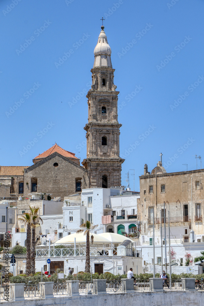 The bell tower of the Basilica of the Madonna della Madia, Monopoli Cathedral in the old town of Monopoli, Puglia, Italy
