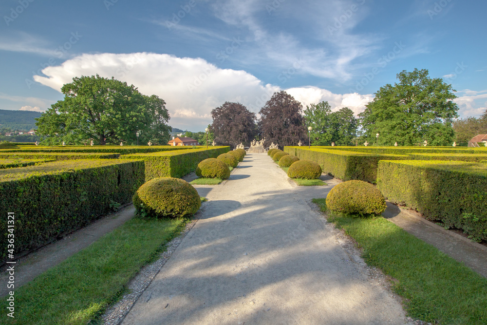 Fototapeta premium historic castle garden with blue sky and clouds - Cesky Krumlov