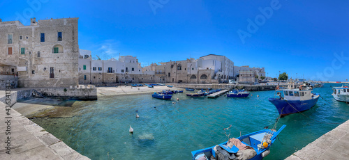 Fotografie Boats moored at the Porto Antico in the old town of Monopoli, Puglia, Italy
