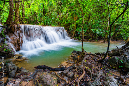 Waterfall and blue emerald water color in Huay Mae Khamin national park. Huay Mae Khamin  Beautiful nature rock waterfall steps in tropical rainforest at Kanchanaburi province  Thailand