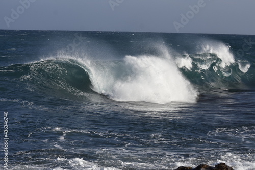 the waves of the sea demonstrate their power