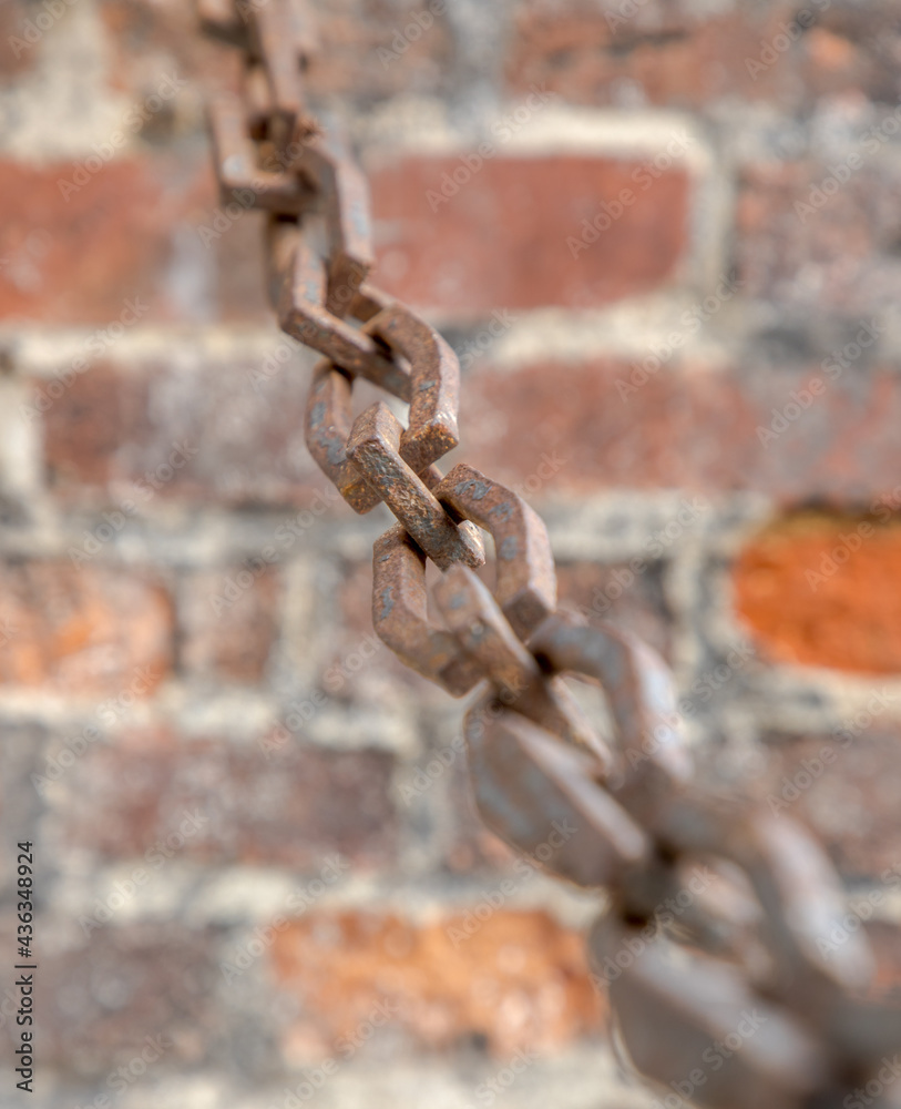 detail of an old massive rusty chain