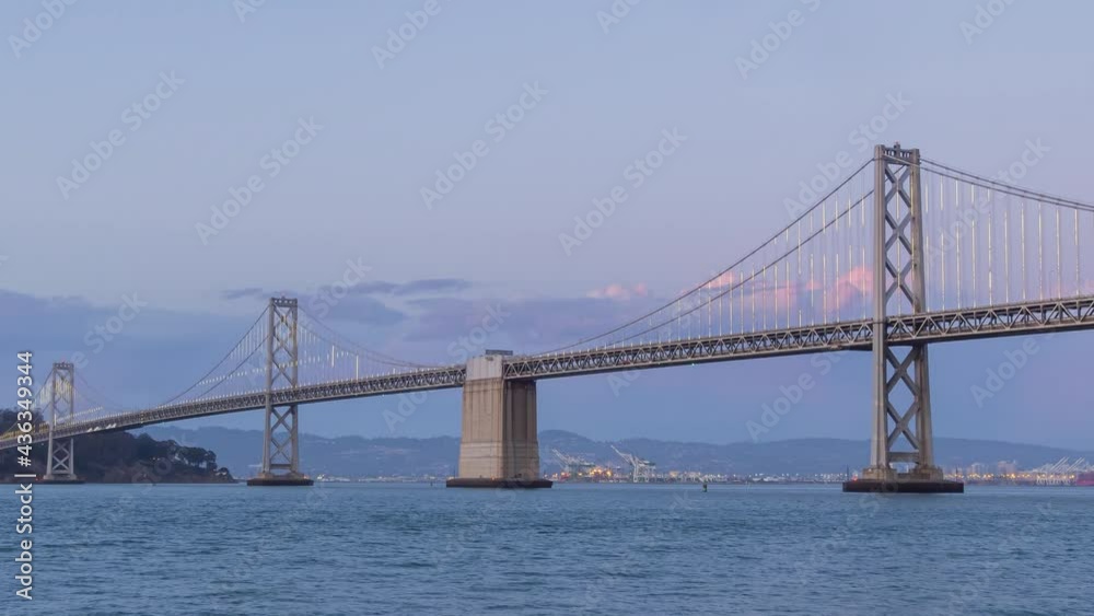 Sunset to night time lapse of the San Francisco Oakland Bay Bridge Sunset to night time lapse of the San Francisco Oakland Bay Bridge
