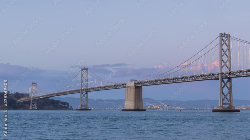 Sunset to night time lapse of the San Francisco Oakland Bay Bridge Sunset to night time lapse of the San Francisco Oakland Bay Bridge