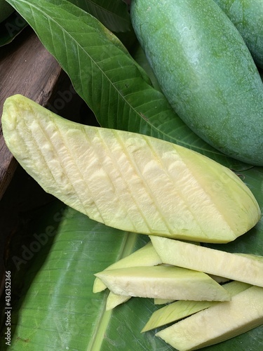 the vertical image of fresh Peeled mango
