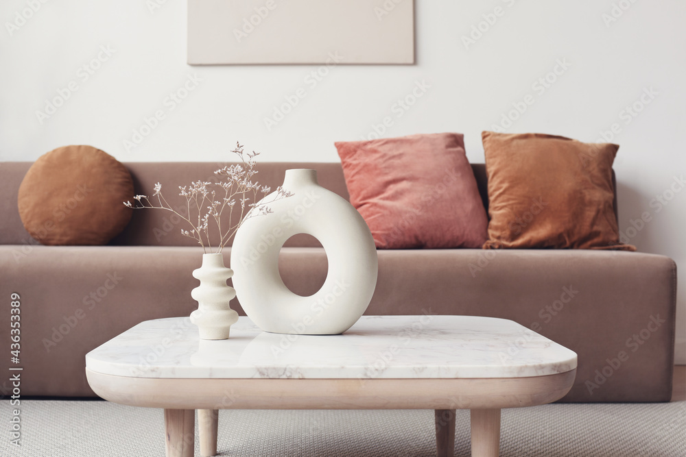Obraz na płótnie View of modern scandinavian style interior with sofa. Home staging and minimalism concept w salonie