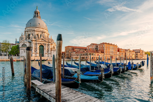 Gondolas and Santa Maria della Salute famous church, Venice, Italy © ronnybas