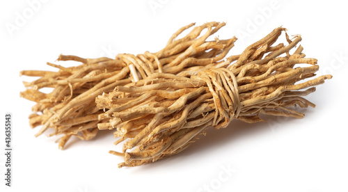 bunch of dried vetiver roots isolated on white background
