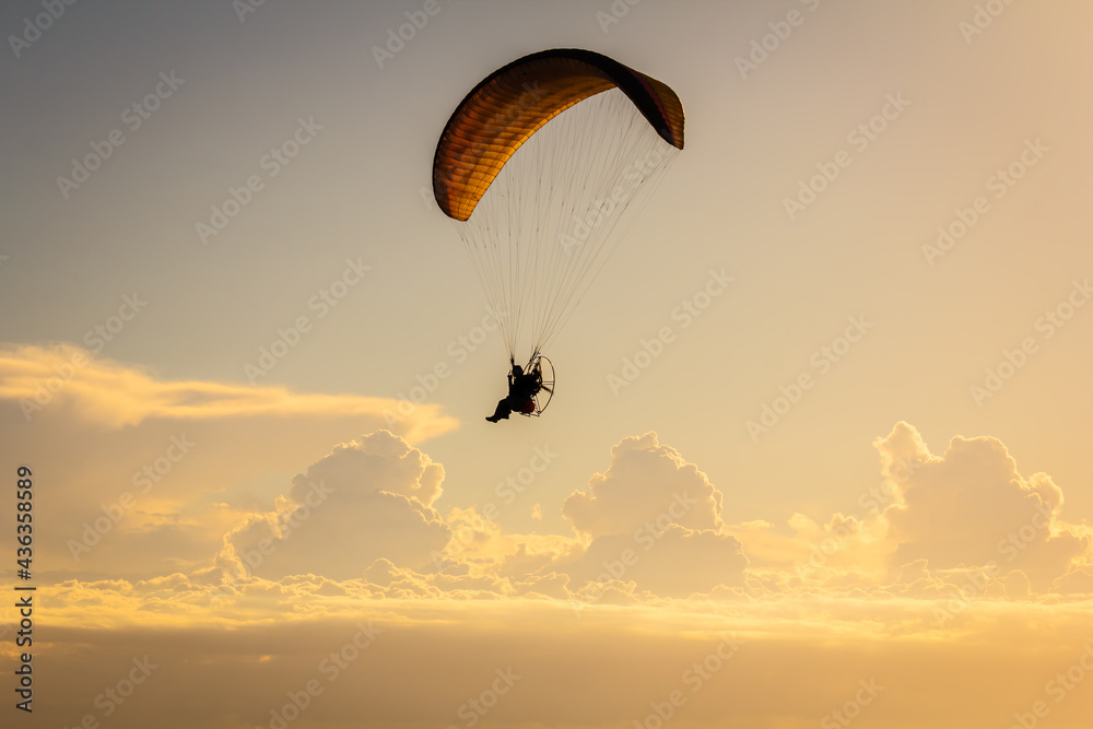 Paraglider fly in the sky above the sea.
Paraglider fly in the sky above the sea.