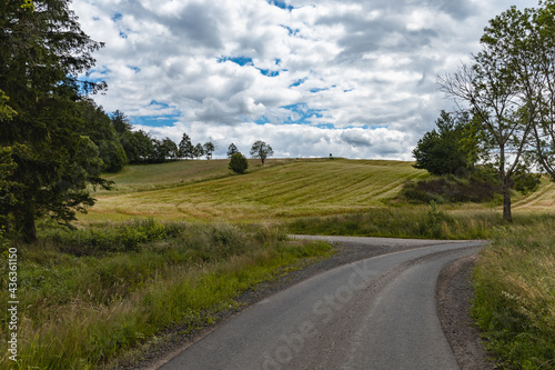 Long mountain trail in Walbrzych mountains with beautiful panorama of mountains photo