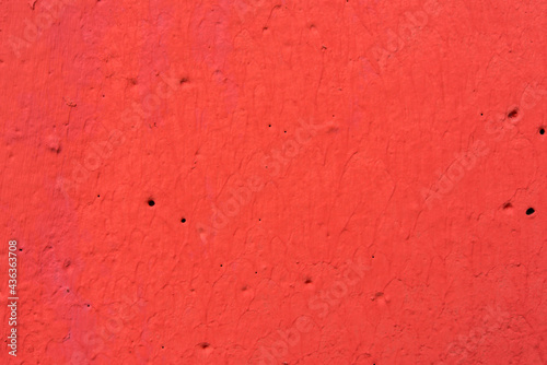 Red painted concrete wall © Georgii Shipin