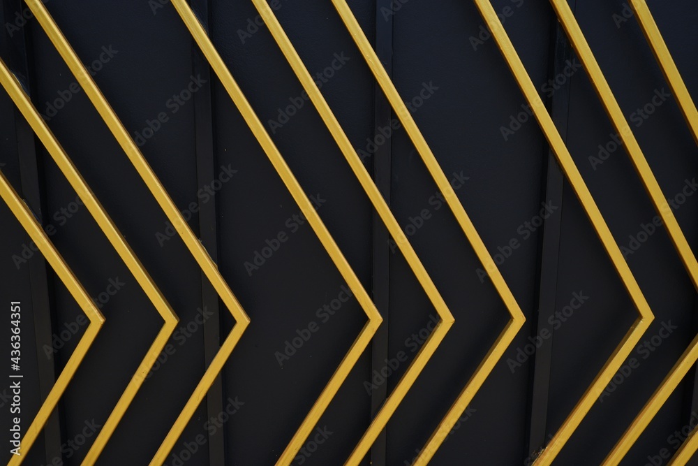 Abstract arrow yellow iron lines on black background. Abstract arrow yellow iron lines on black background.