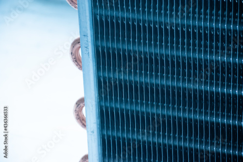 Close up aluminum fin of cooling condenser coil of air condition system. Pattern for abstract background.
