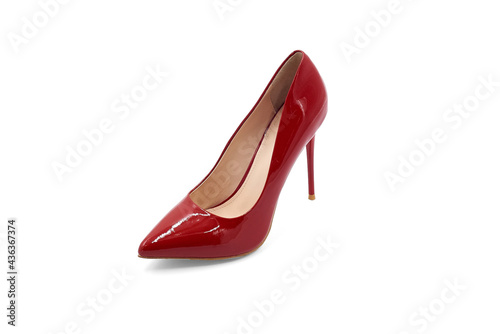 Women's red high-heeled shoes made of glossy leather on a white background. Isolate