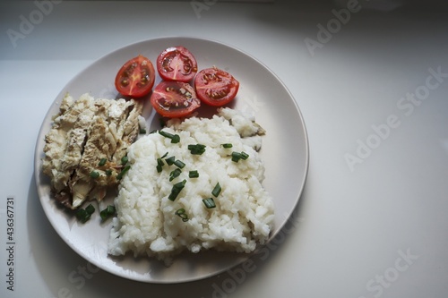 Rice with baked fish and tomatoes 