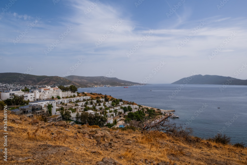 Bodrum, Turkey - october 2020: Sunset view from Bodrum coast. Bodrum is one of the most popular summer destinations on Turkey, located by the Aegean Sea, Turkish Riviera.