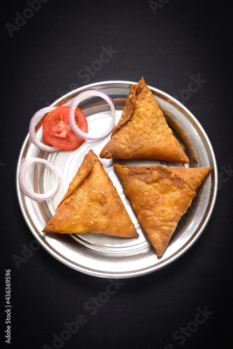 keema samosa in plate with salad  photo