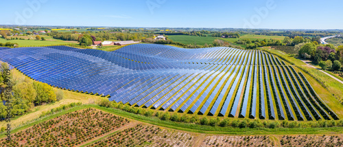 Solar Energy Park in Silkeborg, Denmark. It covers an area of 156.000 m2 or 22 football fields and has 12,000 solar panels.	
 photo