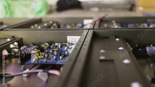 Wallpaper Mural Slider shot of a metal components and microcircuits in workshop laboratory Torontodigital.ca