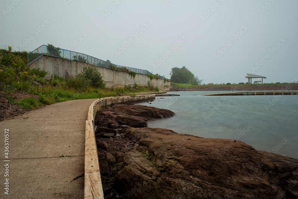 McQuade Small Craft Harbor Shoreline in Duluth, Minnesota with fog. McQuade Small Craft Harbor Shoreline in Duluth, Minnesota with fog.