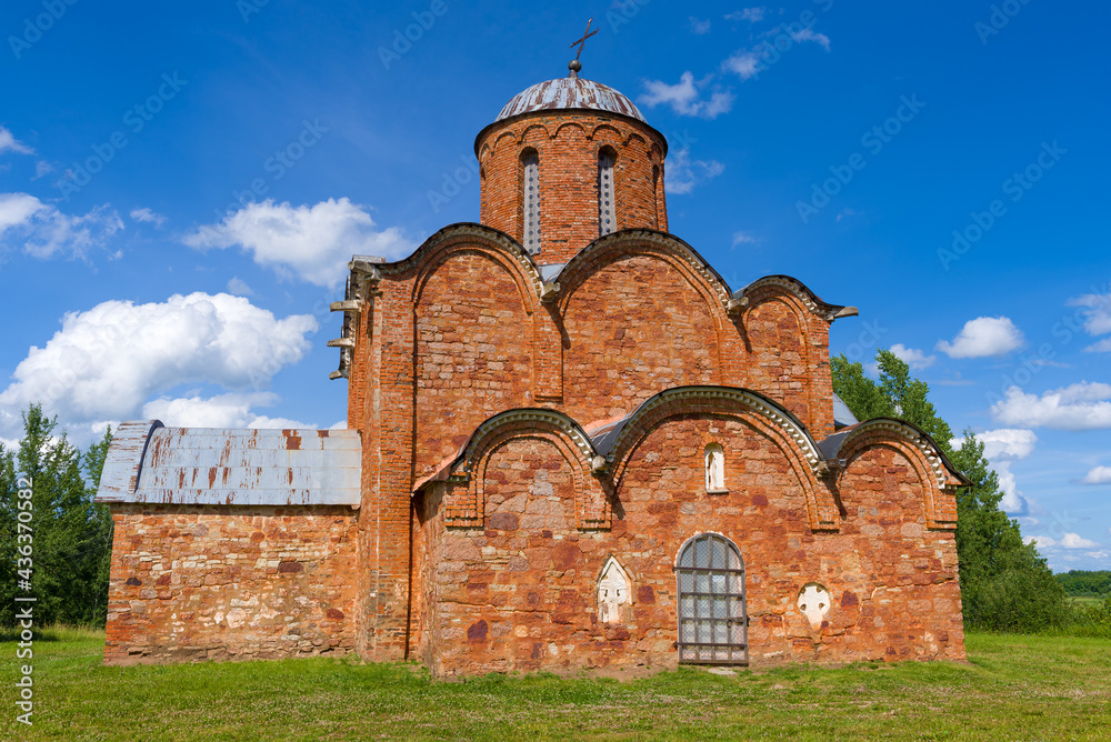 Ancient Church of the Transfiguration of the Savior (Savior on Kovalevo) close-up on a sunny June day. Outskirts of Veliky Novgorod, Russia