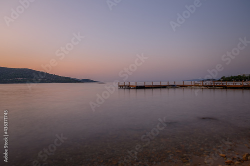 sunset over bay in Aegean sea. Torba, Bodrum, Turkey. October 2020. Long exposure picture