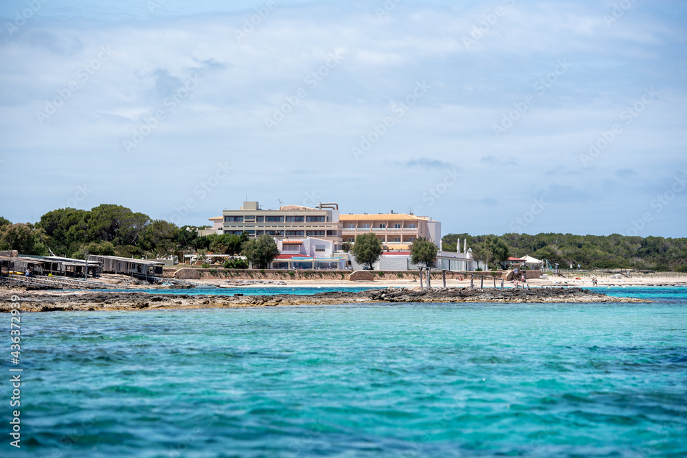 View on the beach of Es Pujols in Formentera in summer 2021.