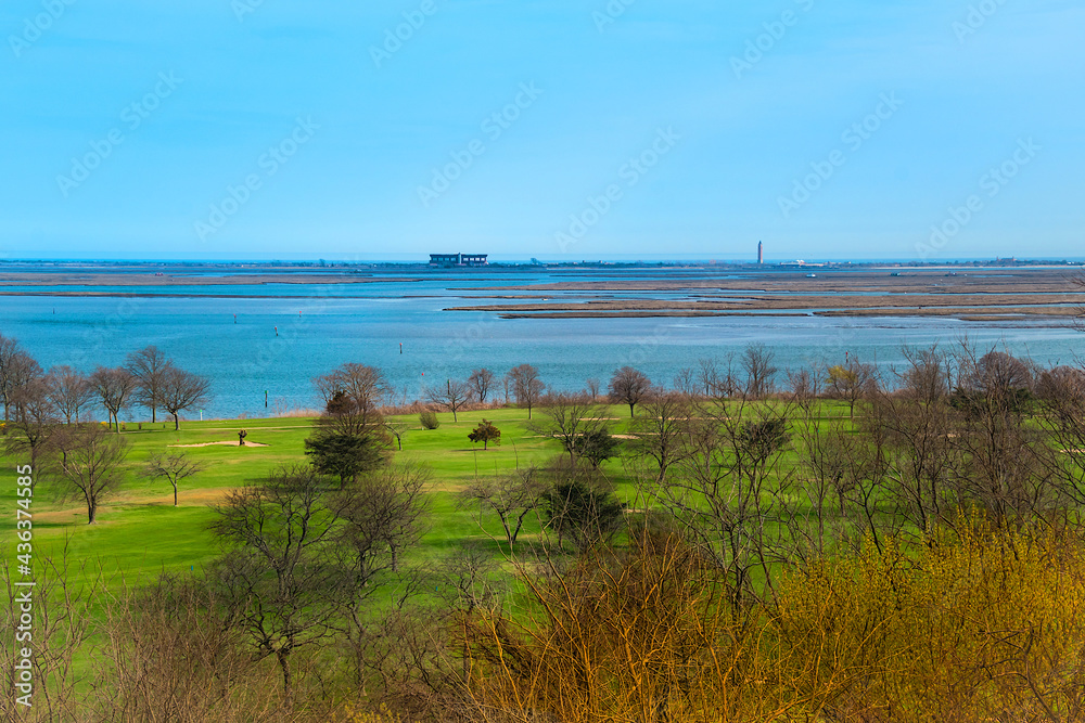 A distance  view of Jones Beach from Norman J. Levy Park and Preserve, Merrick, New York