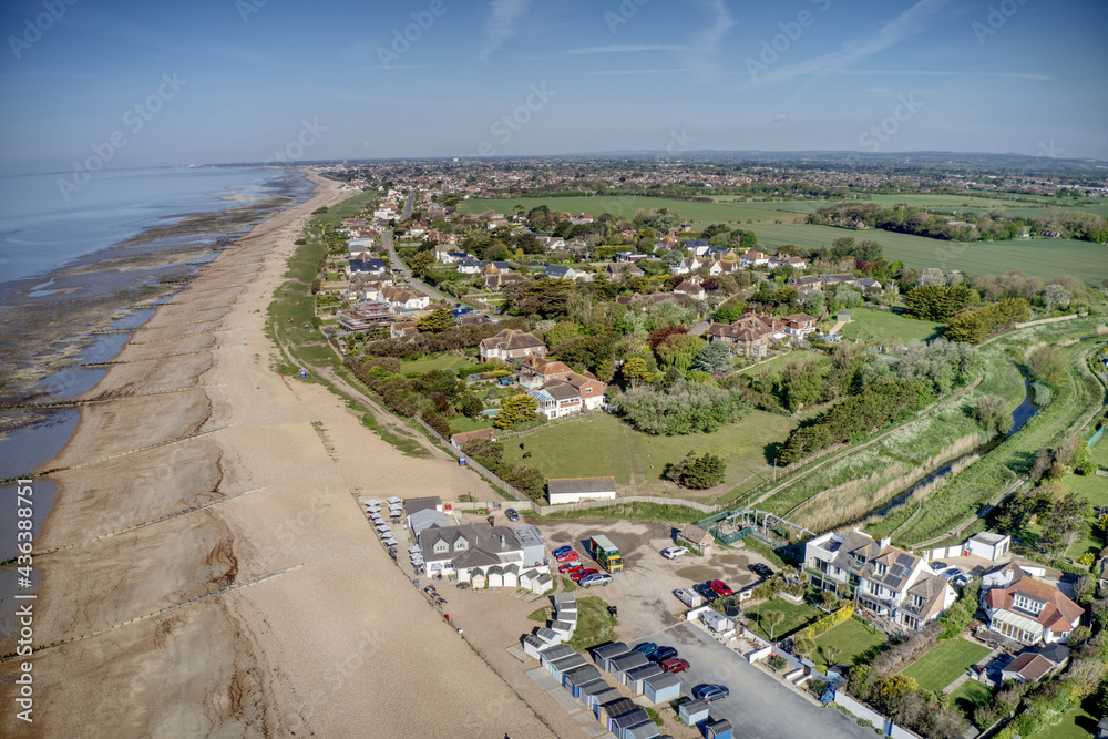 Kingston Gorse in West Sussex aerial view with Ferring Rife and seafront in view on the South of England coastline.