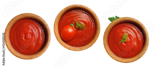 ketchup in wooden isolated on white background