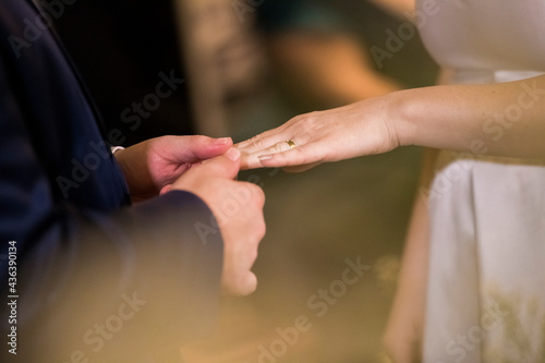the time of the wedding ceremony when the bride and groom put the rings in hand