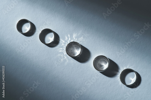 Row of shiny sterling silver engagement rings