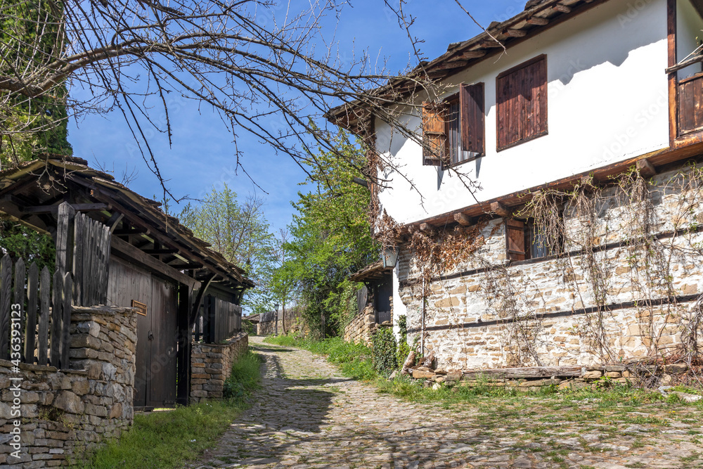 Typical street and old houses at historical village of Bozhentsi,  Bulgaria