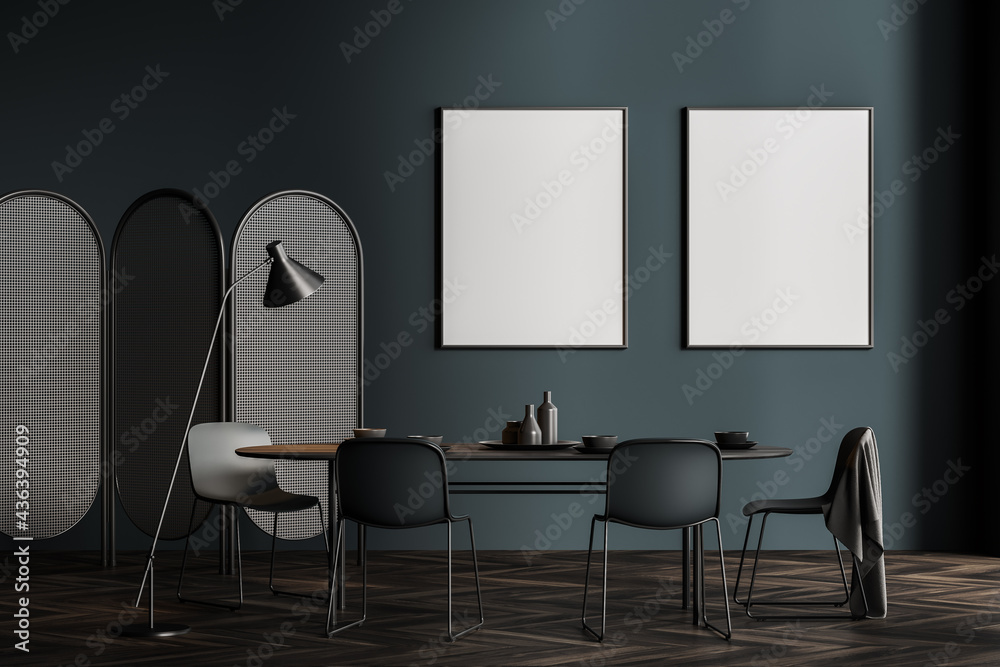 Dark grey dining room interior with two posters Dark grey dining room interior with two posters