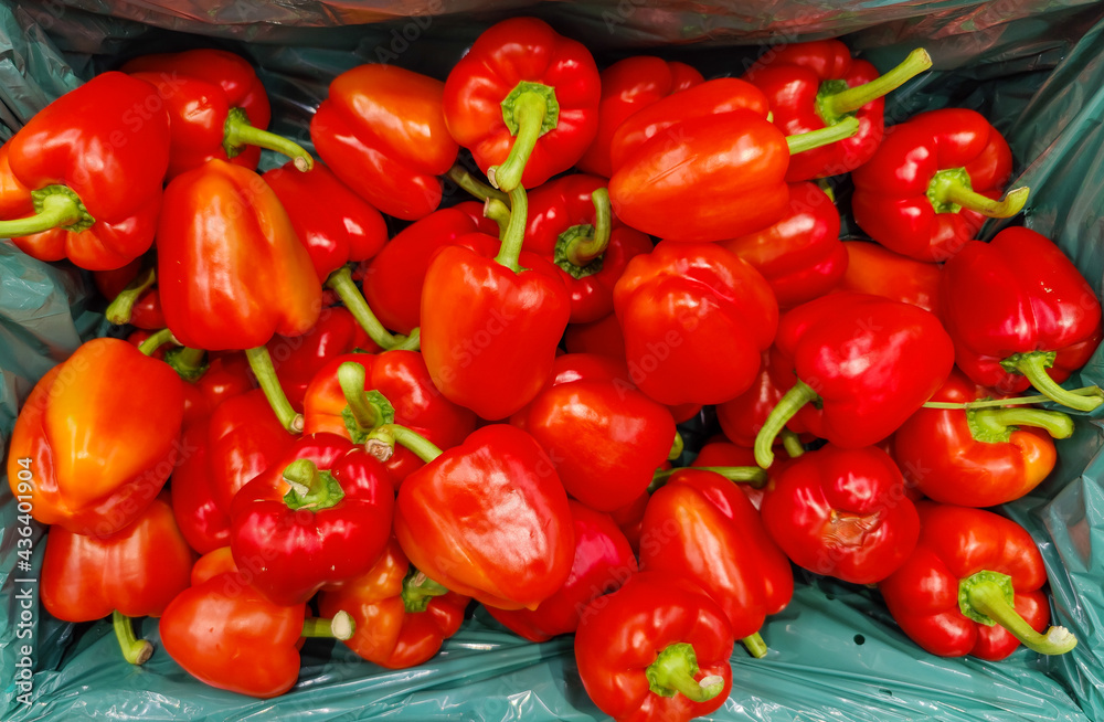 Red peppers on display at a market