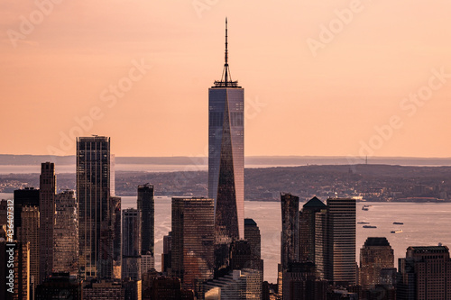 New York City - USA - Apr 3 2021: Pink Sunset Light Close Up View of One World Trade Lower Manhattan © Edi Chen