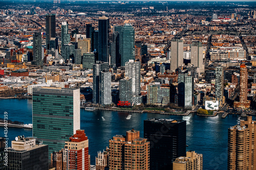 New York City - USA - Apr 3 2021: Sunny Day Bird Eye View of East River Long Island City © Edi Chen