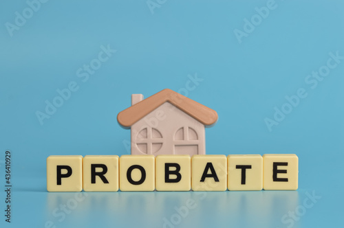 Toy house and alphabet letters with text PROBATE photo