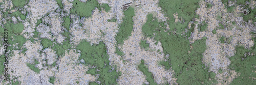 Peeling paint on the wall. Panorama of a concrete wall with old cracked flaking paint. Weathered rough painted surface with patterns of cracks and peeling. Wide panoramic grungy texture for background